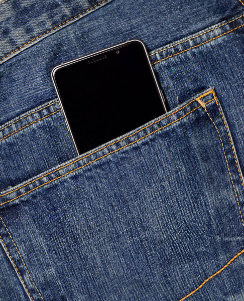 smartphone in the back pocket of jeans