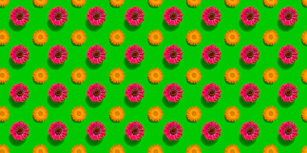 Repeating pattern of red and yellow flowers on a green background, for creative work.