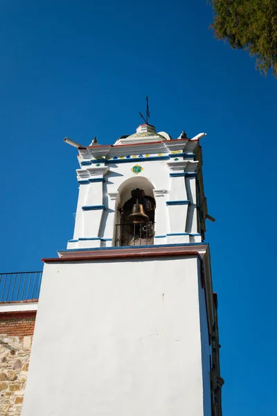 Bell tower detail of Virgin Mary of the Assumption church in Santa Mara, Mexico