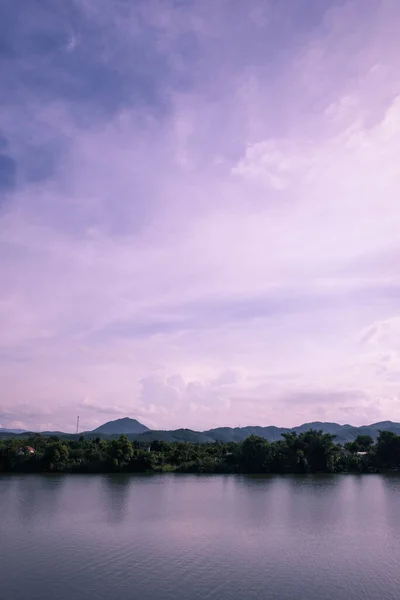 Perfume river under bright sky, Hue