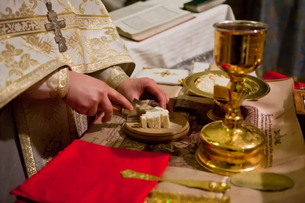 Preparation of Holy Communion in the Temple Altar