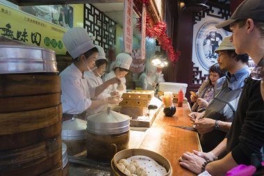 İnsanların Shanghai hamur tatlısı gıda durak, satın alma