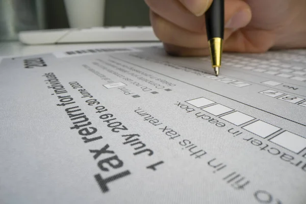 Completing Australian tax form — Stock Photo, Image