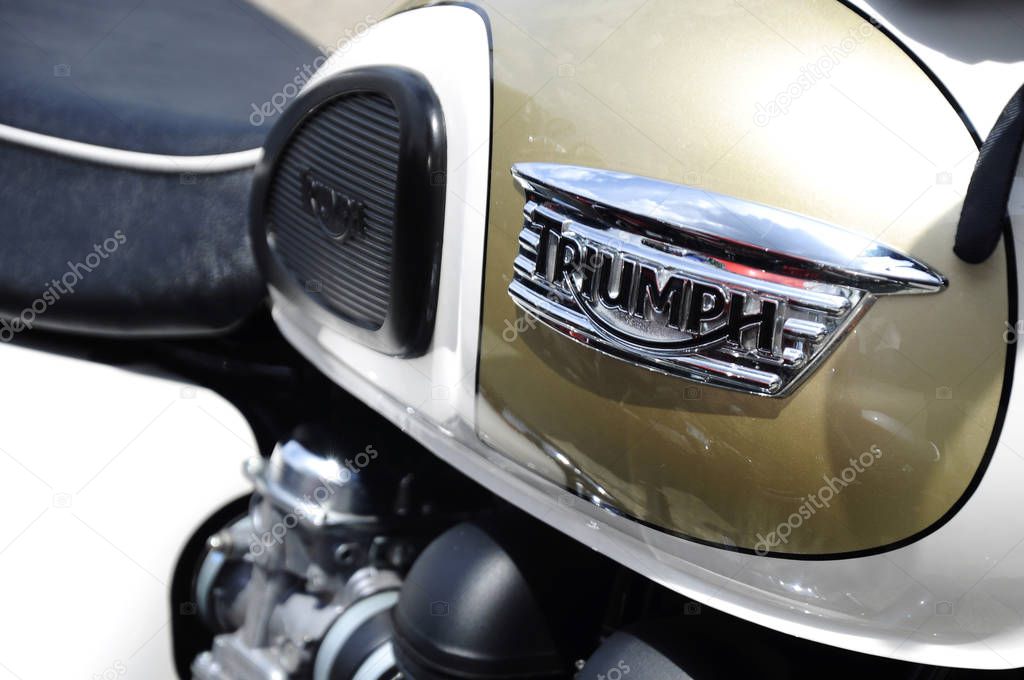 KUALA LUMPUR, MALAYSIA -MARCH 24, 2018: Triumph motorcycle & brand logos. The logos and emblem were printed on the motorcycle body. Some of the logos were different depending on the motorcycle model.