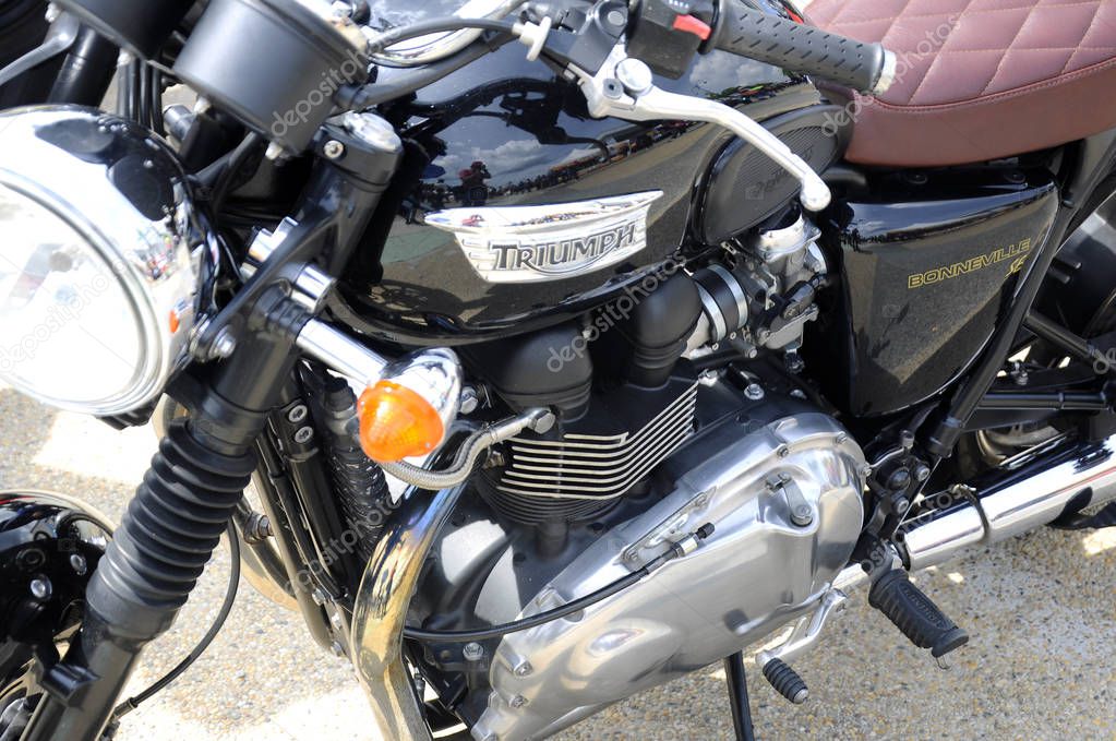 KUALA LUMPUR, MALAYSIA -MARCH 24, 2018: Triumph motorcycle & brand logos. The logos and emblem were printed on the motorcycle body. Some of the logos were different depending on the motorcycle model.
