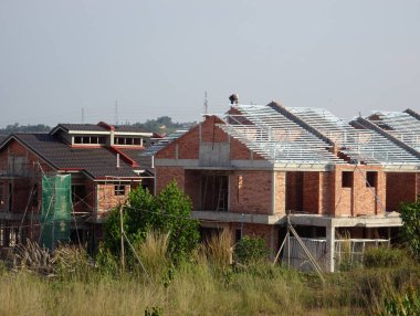 Kuala Lumpur, Malezya-26 Mayıs 2017: teras ev yapım aşamasında Malezya. Modern ve çağdaş tarzı ile bir mimar tarafından tasarlanmış. Tuğla kullanılarak inşa duvar. 