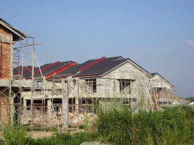 Kuala Lumpur, Malezya-26 Mayıs 2017: teras ev yapım aşamasında Malezya. Modern ve çağdaş tarzı ile bir mimar tarafından tasarlanmış. Tuğla kullanılarak inşa duvar. 