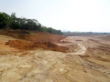 Kuala Lumpur, Malezya-07 Temmuz 2017: ağır makine Hafriyat inşaat sahasında yapıyor. Works gerekli düzeyi almak bina inşaat başlamadan önce yürütülen. 