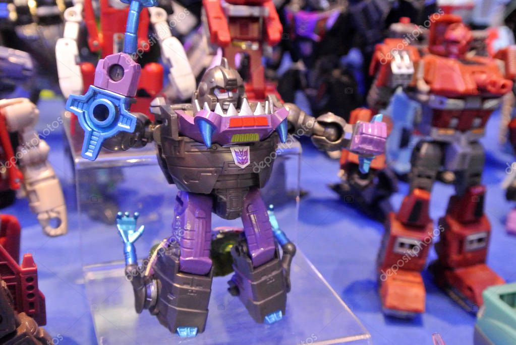 KUALA LUMPUR, MALAYSIA -APRIL 07, 2018:  Fictional character TRANSFORMERS toy action figure from cartoon developed in 1980s by Hasbro. Protagonist Autobots and antagonist Decepticons. Display for pubic by collector.