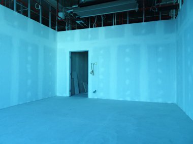 Kuala Lumpur, Malezya-29 Mart 2018: Drywall yükleme yapım aşamasında şantiyede inşaat işçileri tarafından. Bölüm için bir iç duvar yapmanın en kolay ve en ucuz yolu olduğunu. 