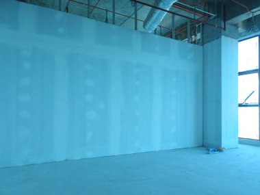 Kuala Lumpur, Malezya-29 Mart 2018: Drywall yükleme yapım aşamasında şantiyede inşaat işçileri tarafından. Bölüm için bir iç duvar yapmanın en kolay ve en ucuz yolu olduğunu. 