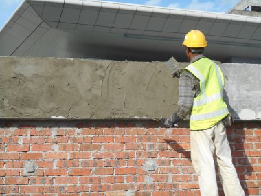Malacca, Malaysia-24 Ağustos 2016: inşaat işçileri inşaat alanındaki formu tuğla duvar tuğla döşeme.  