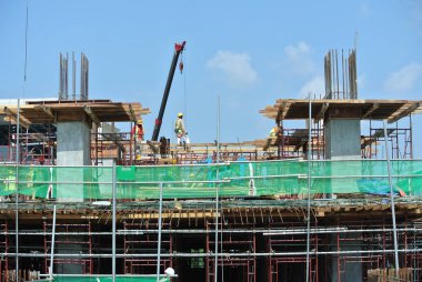 Kuala Lumpur, Malezya-13 Haziran 2016: inşaat alanında devam eden Malezya gündüz sırasında. Günlük aktivite devam ediyor. 