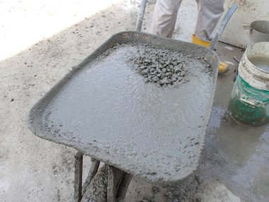 Malacca, Malaysia-27 Kasım 2014: ıslak betonda el arabası