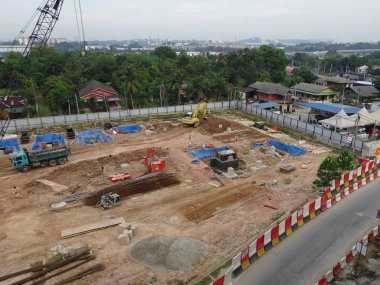 Malacca, Malaysia-13 Haziran 2016: şantiye gündüz sırasında Malacca, Malaysia, sürüyor. Günlük aktivite devam ediyor. 