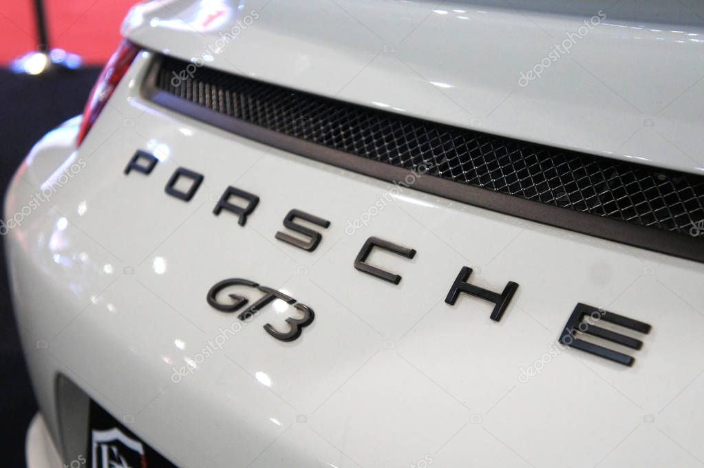 KUALA LUMPUR, MALAYSIA -NOVEMBER 25, 2018: Porsche car logos and emblem at the car body. High-performance sport car manufacture owned by Volkswagen and based at Germany.