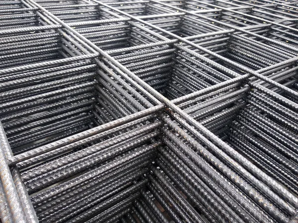 BRC welded wire mesh or BRC fabric used as part of the main structural component in floor slab structure element in the construction site. Comes in various size depend on design.