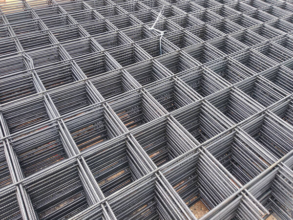 BRC welded wire mesh or BRC fabric used as part of the main structural component in floor slab structure element in the construction site. Comes in various size depend on design.  