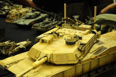 KUALA LUMPUR, MALAYSIA -OCTOBER 6, 2018: Selected focused miniature model of military tanks and amour vehicles. Display for public by collector. clipart