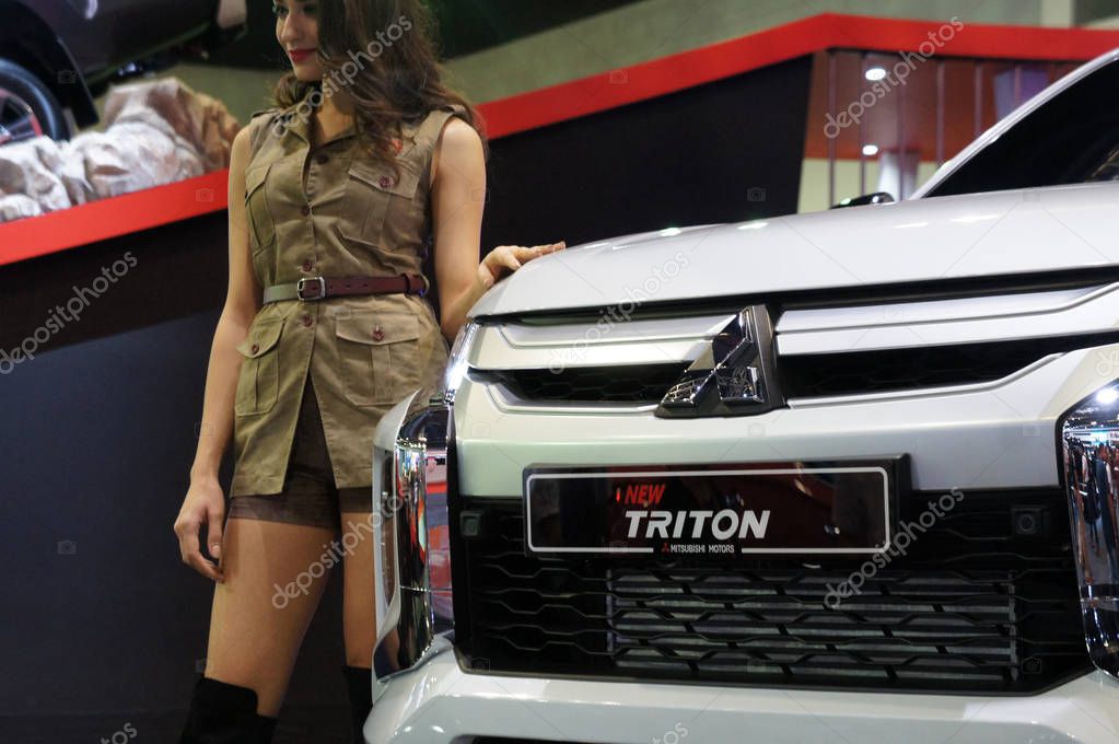 KUALA LUMPUR, MALAYSIA -NOVEMBER 23, 2018: Mitsubishi commercial brand car, the emblem and logos at the car body. Mitsubishi is one of the famous car manufactures in the world from Japan.