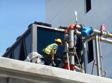 Kuala Lumpur, Malezya-Haziran 17:2018: geri soğutucu Boru tesisat yapım aşamasında inşaat sahasında ve tedarik Klima. 