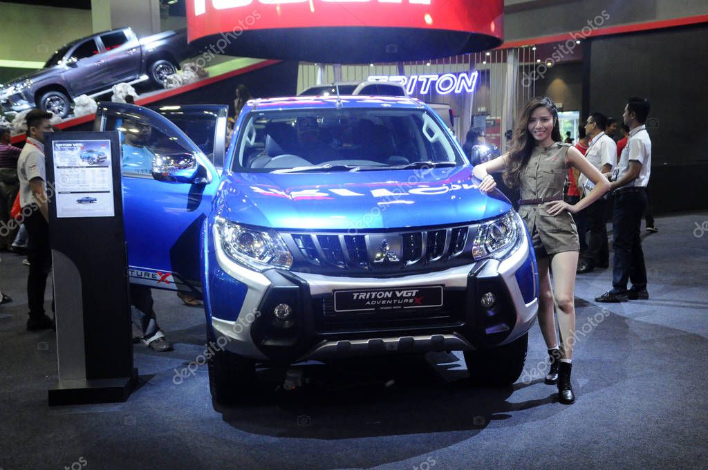 KUALA LUMPUR, MALAYSIA -NOVEMBER 23, 2018: Mitsubishi truck displayed in huge sale showroom. Mitsubishi is one of the famous cars manufactures in the world from Japan.