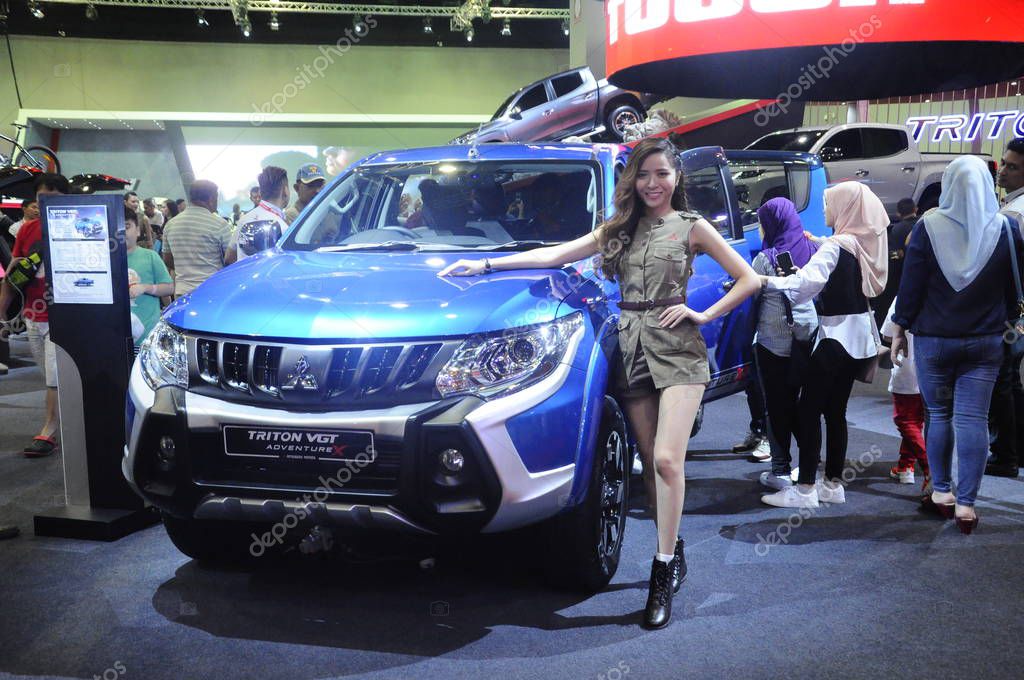 KUALA LUMPUR, MALAYSIA -NOVEMBER 23, 2018: Mitsubishi truck displayed in huge sale showroom. Mitsubishi is one of the famous cars manufactures in the world from Japan.