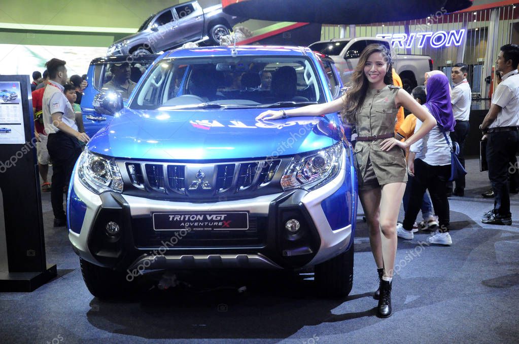 KUALA LUMPUR, MALAYSIA -NOVEMBER 23, 2018: Mitsubishi truck displayed in huge sale showroom. Mitsubishi is one of the famous cars manufactures in the world from Japan.