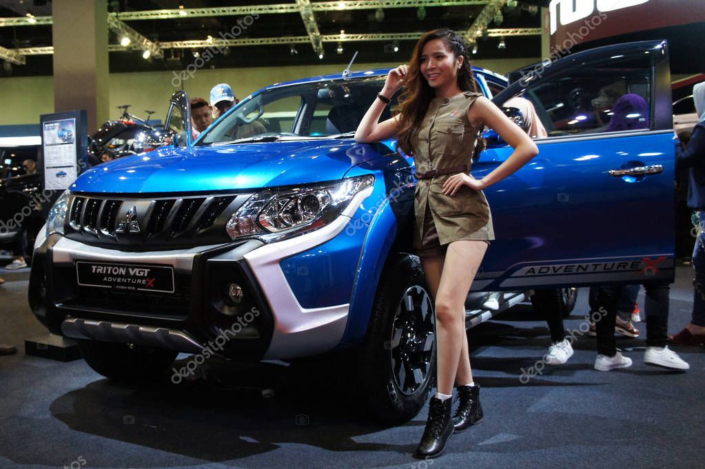 KUALA LUMPUR, MALAYSIA -NOVEMBER 23, 2018: Mitsubishi truck displayed in huge sale showroom. Mitsubishi is one of the famous cars manufactures in the world from Japan.