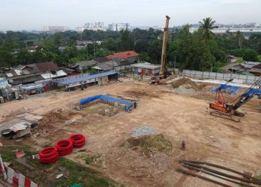 Malacca, Malaysia-13 Haziran 2016: şantiye gündüz sırasında Malacca, Malaysia, sürüyor. Günlük aktivite devam ediyor. 