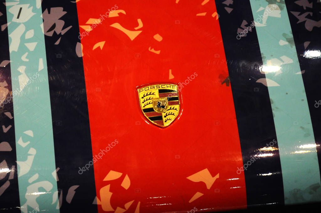 KUALA LUMPUR, MALAYSIA -NOVEMBER 25, 2018: Porsche car logos and emblem at the car body. High-performance sport car manufacture owned by Volkswagen and based at Germany.
