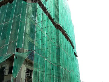 Kuala Lumpur, Malezya-18 Temmuz 2019: Catch platformu ve Emanet örgü yüksek katlı bina inşaatı sırasında bina yüzüne. Bireyler ve özellik düşen enkaz korur. 