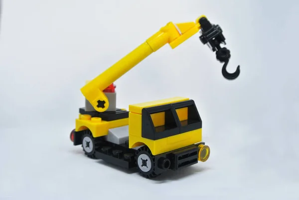 Selective Focused Miniature Mobile Crane Machine Made Plastic Block Isolated — Stock Photo, Image