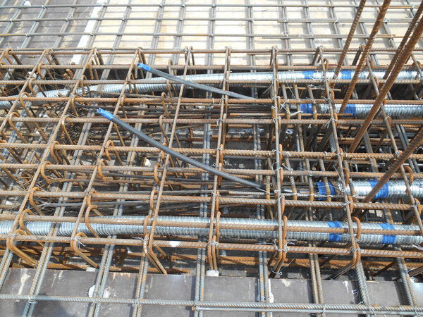 MALACCA, MALAYSIA -APRIL 14, 2016: Pre-stress cable tendons anchor head for pre-stressed concrete at the construction site. It is a technology to get better concrete slab quality with larger span.  