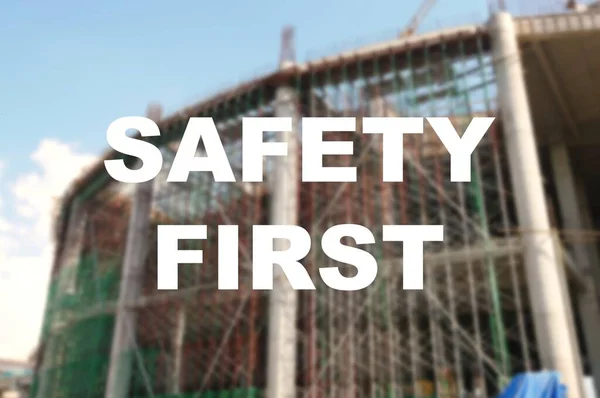 Word Safety First Written Clearly Background Image Worker Installing Scaffolding — Stock Photo, Image