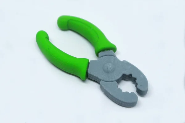 Selected Focused Green Toy Pliers Made Soft Rubber Isolated White — Stock Photo, Image