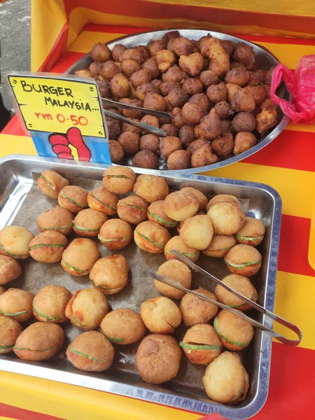 SEREMBAN, MALAYSIA -MARCH 1, 2020: Malaysian cakes are on display for sale on the table. Sort by type to make it easier for customers to buy.