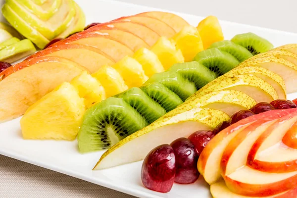 Eat a Colorful Variety of Fruits every Day for Better Health. colorful of sliced fruits.