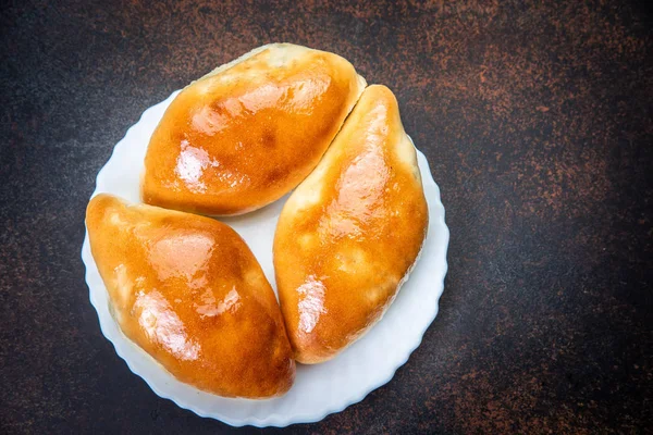 Sortierte frische, üppige Brötchen und Kuchen lizenzfreie Stockbilder