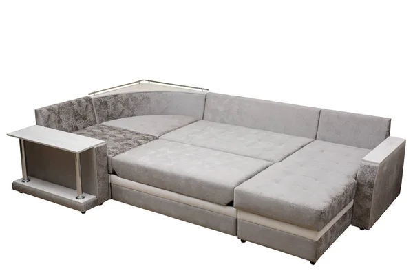 Modernes multifunktionales, klassisch graues Sofa mit Ständer und Kissen, isolierter weißer Hintergrund. Möbel, Interieur, stilvolles Sofa Stockbild