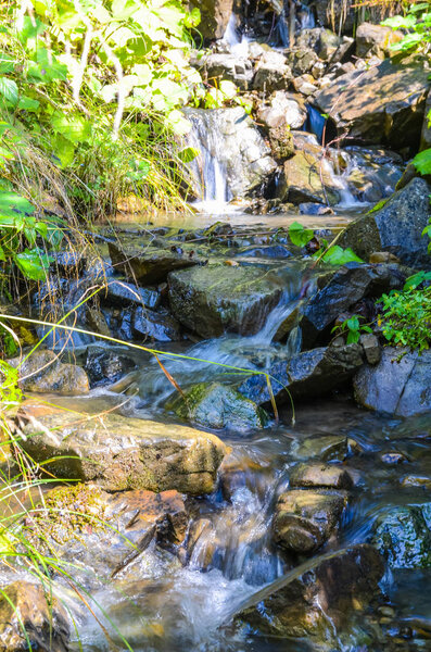 Small creek in the Carpathian mountains inthe autumn season