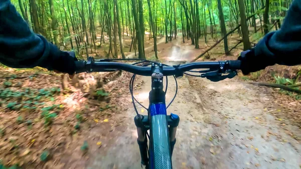 Amateur rider riding on the trails in the autumn season