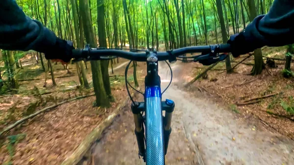 Amateur rider riding on the trails in the autumn season