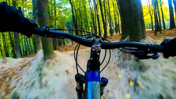 Amateur rider riding on the trails in the autumn season