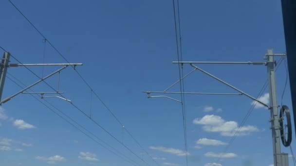 Electrical Wires Poles Seen Moving Train — Stock Video