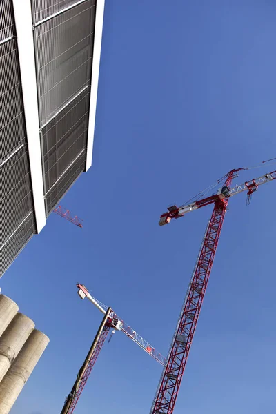 Cranes on a blue sky background — Stock Photo, Image