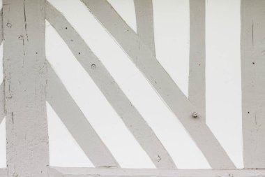 Gri ahşap duvarlı arka plan, tipik bir Fransız evi duvarı.