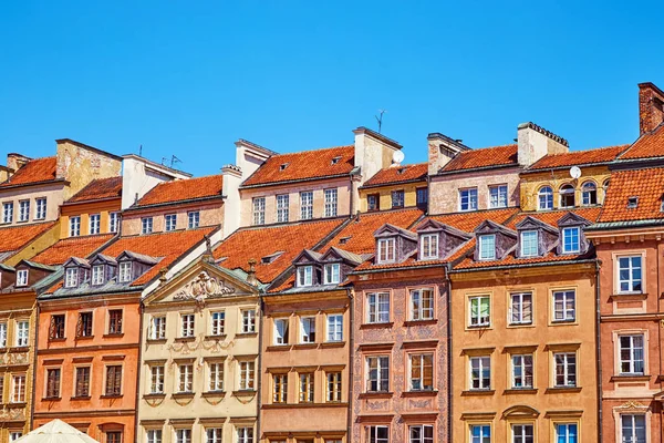 The bright facades of historic buildings on the market square in Warsaw, Poland