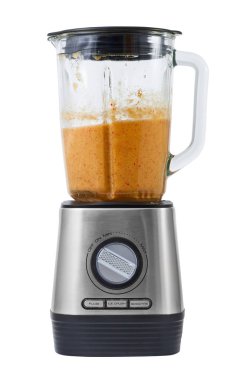 Sabit blender ile elma, pumpkins, çilek ve yeşil yapılmış pişmiş güler yüzlü.