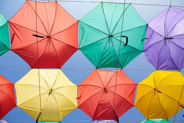 Colorida guarda-chuvas fundo — Fotografia de Stock